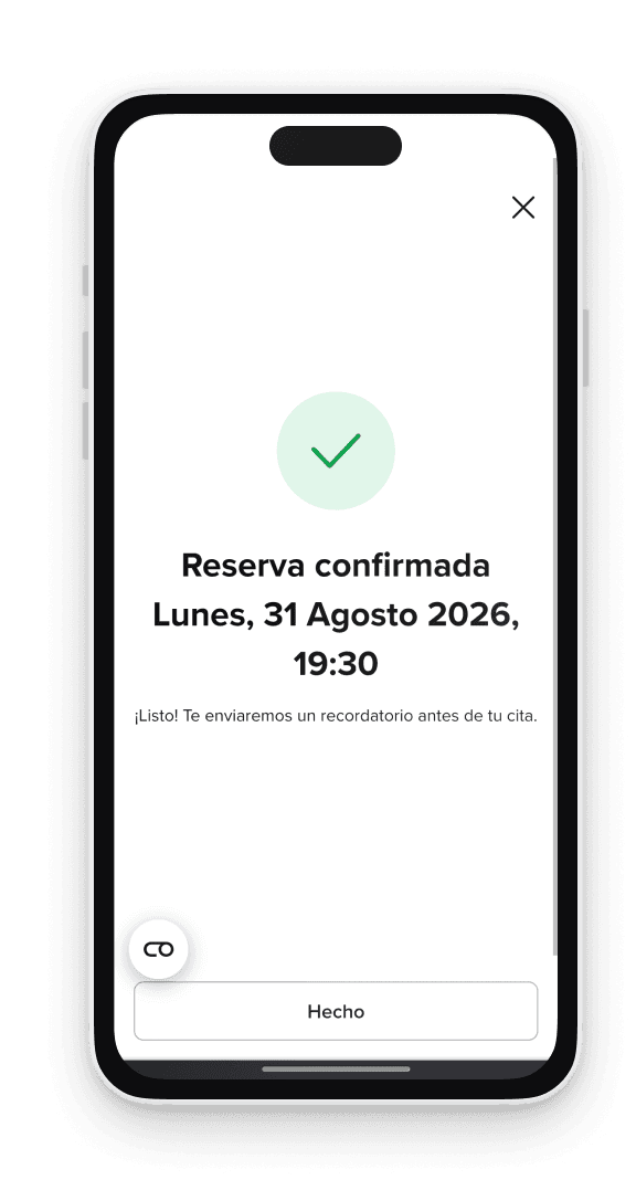 Pantalla de reserva confirmada en el móvil, con el día y la hora de la cita